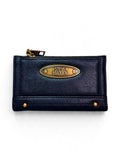 Cartera Steve Madden Negro Placa Dorada
