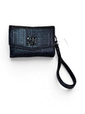 Muñequera Steve Madden negra monograma